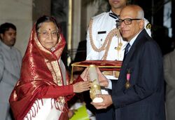 The President, Smt. Pratibha Devisingh Patil presenting the Padma Bhushan Award to Dr. Madabusi Santanam Raghunathan, at an Investiture Ceremony-II, at Rashtrapati Bhavan, in New Delhi on April 04, 2012.jpg