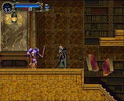 A screenshot, showing the player encountering a headless knight and two flying, large books, in a library area.