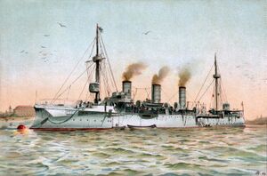 A white warship at anchor in calm seas, with smoke rising slowly from three smokestacks
