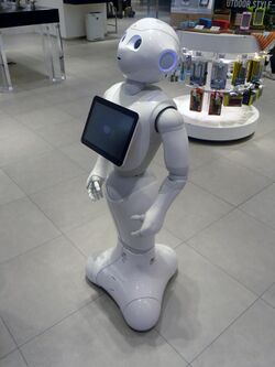 The robot Pepper standing in a retail environment