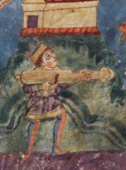 Musician playing a medieval cythara 2.jpg
