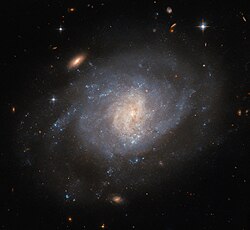 The spiral galaxy NGC 941 photographed by the Hubble Space Telescope.jpg