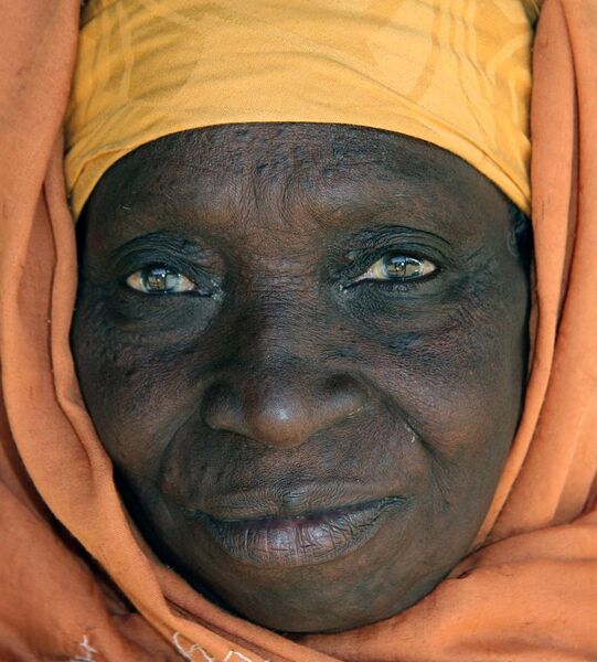 File:Elderly Gambian woman face portrait.jpg