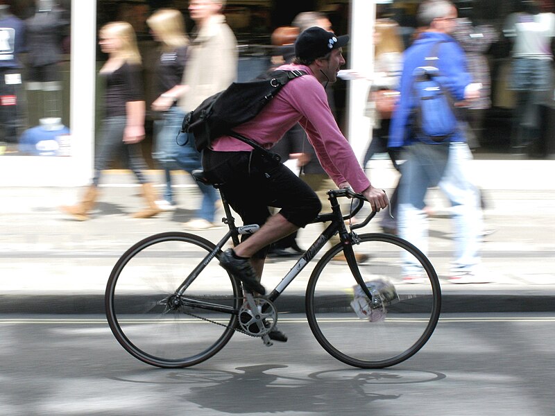 File:Bicycle courier on Oxford Street, London.jpg