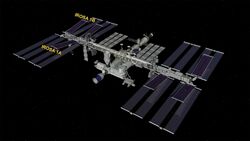 Iss after installation of all roll out solar arrays.jpg