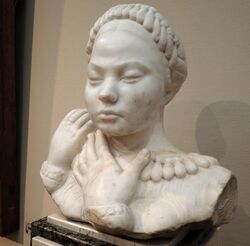 Sculpture (bust) of a young woman with braided hair and hands touching one shoulder, representing Lada