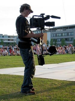 Steadicam and operator in front of crowd.jpg