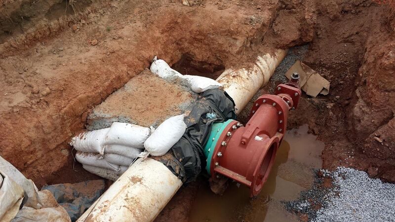 File:Tapping water line in Bentonville, AR.jpg