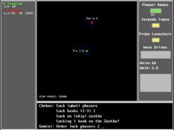 Screenshot of the game "Begin 2". Middle shows a 2D map of the space and the spaceships, right hand shows status of weapons and at the bottom a command window is shown.