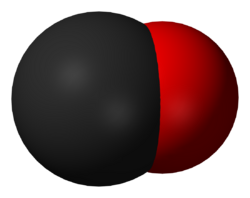 A large black spherical object with a slightly smaller red one merging into it from the right