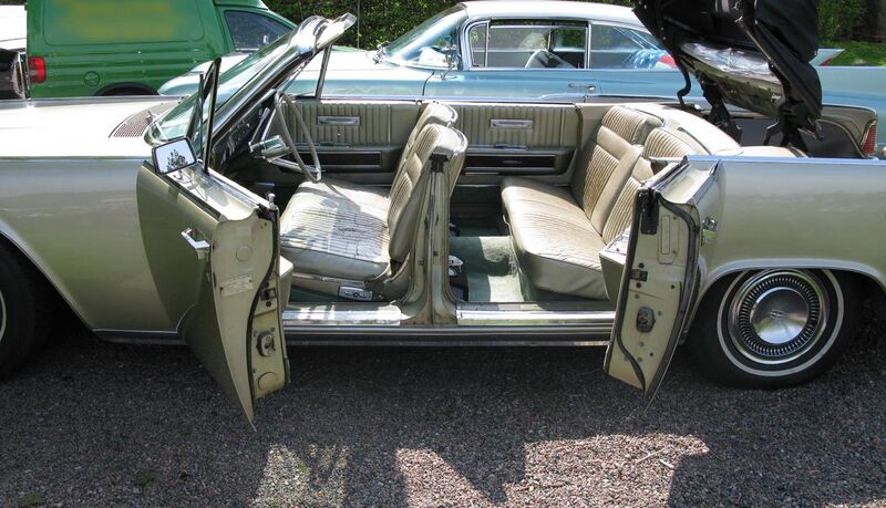 File:1960s Lincoln Continental convertible with suicide doors open.jpg