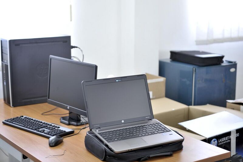 File:A laptop and desktop machine before they were handed over to the Federal Parliament Commitee on National Security, Interior and Governance on 19th January 2014 at the AMISOM office. (12065737555).jpg