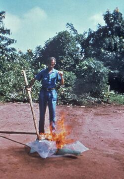CDC worker incinerates med-waste from Ebola patients in Zaire.jpg
