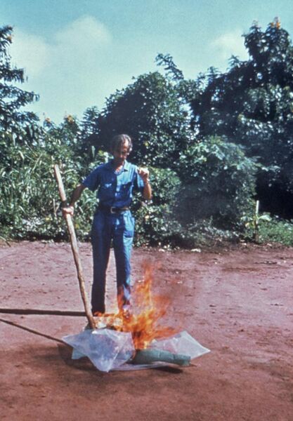 File:CDC worker incinerates med-waste from Ebola patients in Zaire.jpg