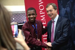 Nigel Farage with attendee (46400882322).jpg