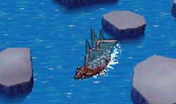 An in-game screenshot of a ship navigating the ocean.