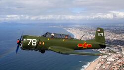 Nanchang CJ-6A Airplane over California Coastline N4183E 20110219.jpg