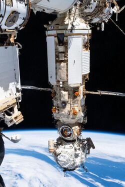 Russian Spacewalkers dwarfed by the Nauka and Prichal modules 2 (cropped).jpg