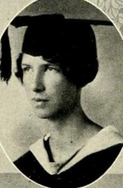 A young white woman wearing an academic cap and gown, in an oval frame