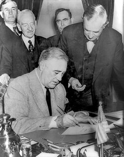 Franklin Roosevelt signing declaration of war against Germany.jpg
