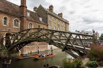 Mathematical Bridge, or officially Wooden Bridge, is an arch bridge in Cambridge, United Kingdom. The arrangement of timbers is a series of tangents that describe the arc of the bridge, with radial members to tie the tangents together and triangulate the structure, making it rigid and self-supporting.