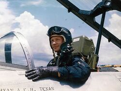Aldrin in cockpit, canopy tilted up