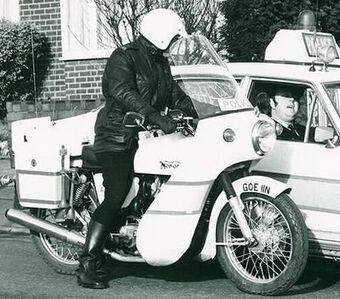 Day 147 - West Midlands Police - Archived photograph of police bike & car CROP (cropped).jpg