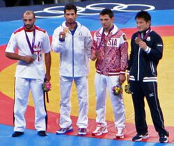 Medalists at the Men's 60 kg Greco Roman Wrestling.jpg