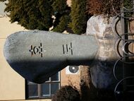 Mushroom-shaped tone with inscription in Korean letters