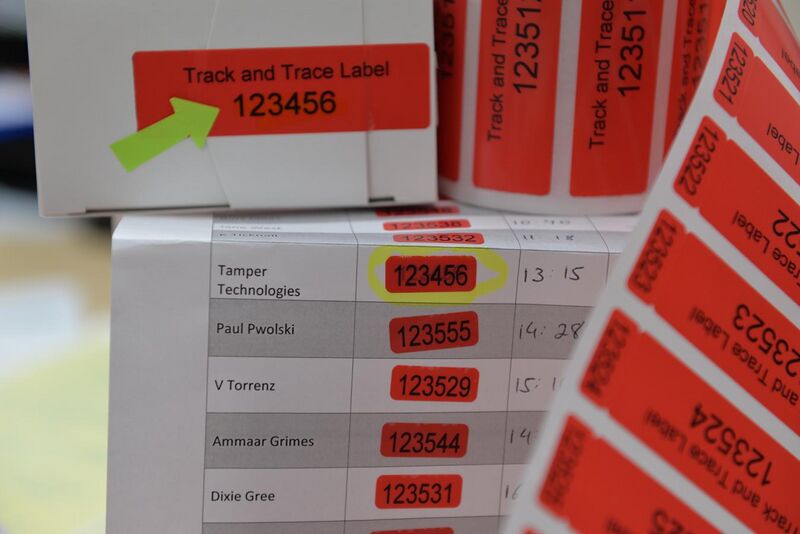File:Dual number tab on a tamper evident label.jpg