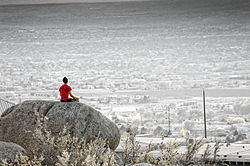A man in yoga asana meditating in Albuquerque NM.jpg