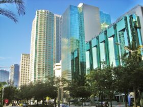 A glass and stucco skyscraper