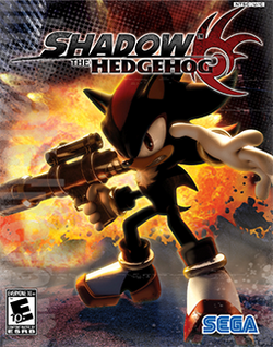 The game's cover art. A black and red hedgehog with spiky hair holds a handgun and other weapons, striking an attacking pose with an unhappy expression on his face. A stylized explosion is visible in the background. The words "Shadow the Hedgehog" adorn the top of the screen, as does a red logo that resembles the hedgehog's head.