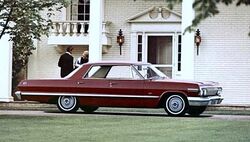 A red 1963 impala hardtop sedan