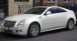 2011 Cadillac CTS-4 Coupe Premium in White Diamond Pearl, front left.jpg
