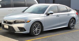 2022 Honda Civic Touring in Lunar Silver Metallic, Front Left, 05-10-2022.jpg