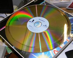 Video LaserDisc for the 1983 film Brainstorm, showing signs of disc rot. Improper manufacturing of many early LaserDiscs allow oxidation to occur between layers, resulting in affected areas of the surface to be unreadable.