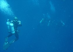 Technical divers at a midwater decompression stop