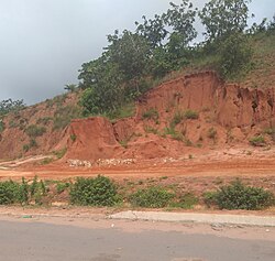 Gulley erosion impact on road along 9th mile Enugu State, Nigeria