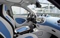 White and blue interior of the third generation Smart fortwo.
