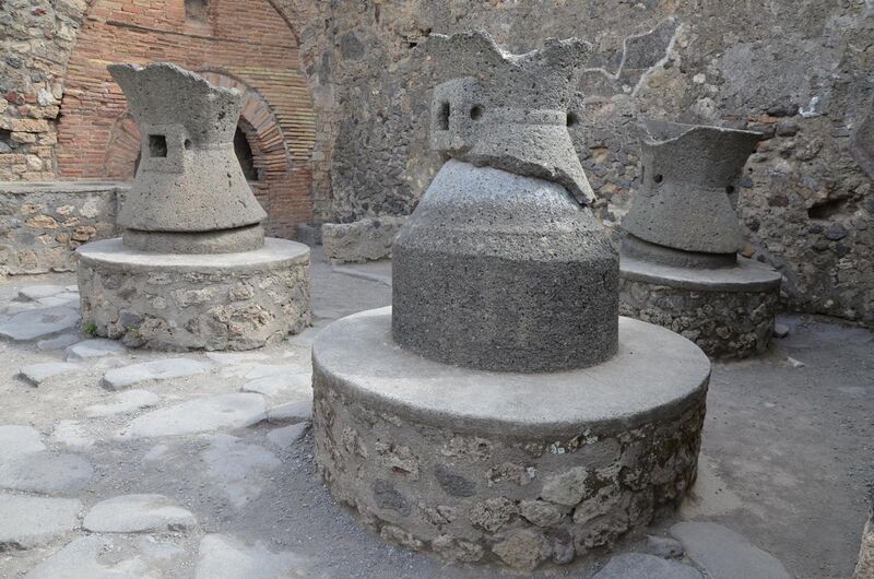 File:Bakery mills for grinding grain (catullus) from a pistrinum (bakery), Pompeii (14856051379).jpg