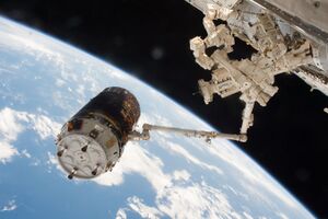 HTV-6 grappled by the International Space Station's robotic arm (2).jpg