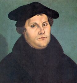 A painting of Christian Reformer Martin Luther, wearing a black hat and high-necked black clothing.