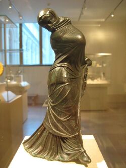 Bronze Statuette of a Veiled and Masked Dancer 1.jpg