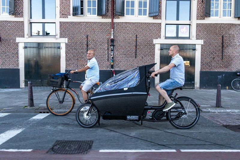 File:Bicyclist at Amsterdam.jpg