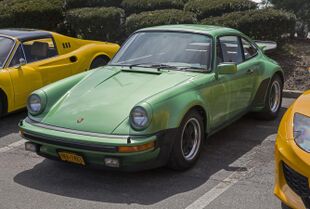 1976 Porsche 930 Turbo, Emerald Green met, front left.jpg