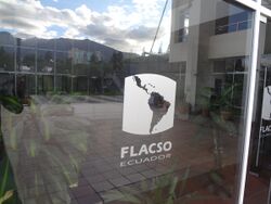 Modern entrance at the One of the main buildings on the FLACSO, Ecuador main campus with a view of Pichincha Volcano.jpg