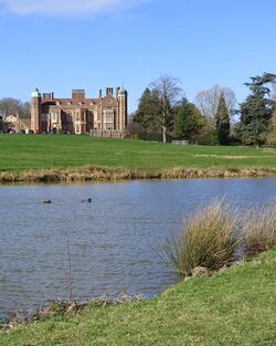 Across the lake to Madingley Hall (geograph 6402209 by John Sutton).jpg