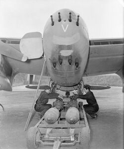 Bombing up Mosquito RAF Hunsdon 1944 IWM CH 12407.jpg