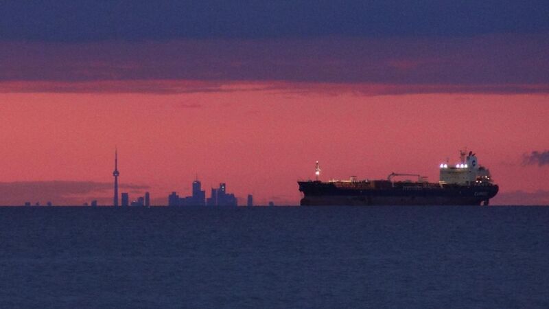 File:Twilight Toronto across Lake Ontario51km with ship5-10km.jpg